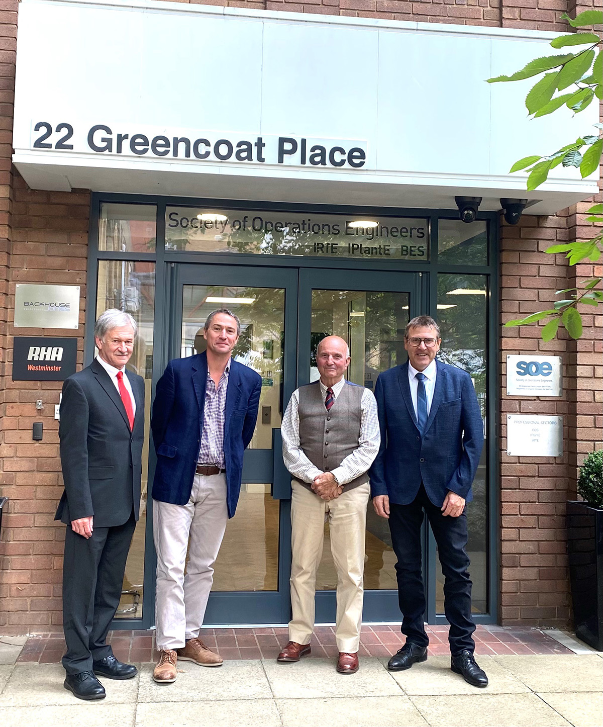 Group of people outside 22 Greencoat place